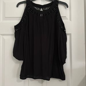 INC cold shoulder top with cute cutouts around neck and shoulders.